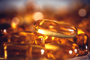 Close up the vitamin D and Omega 3 fish oil capsules supplement  for good brain , heart and health...