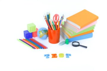word test on the background of school supplies .photo with copy space