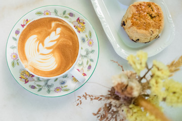 coffee break set with latte and scone