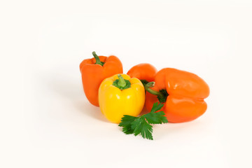 bell pepper and sprig of parsley .isolated on a white background.