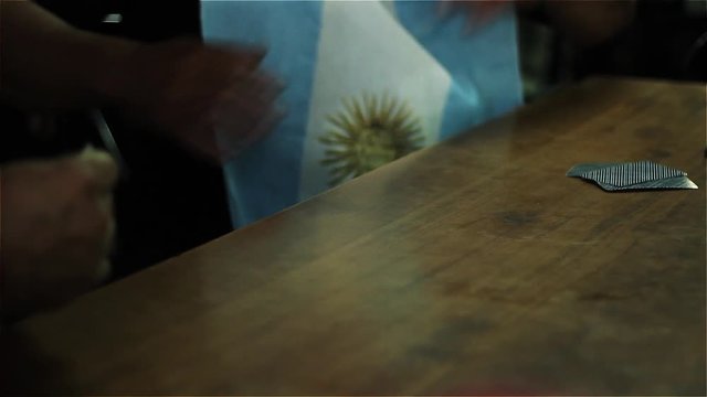 Men Playing Cards. Argentinean Truco (Card game in Argentina).