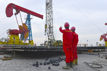 The oil workers in the job