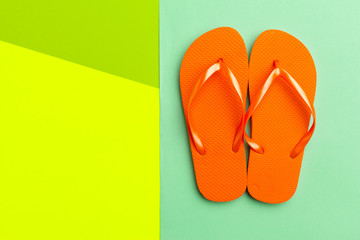 Female flip flops on a colorful vibrant background