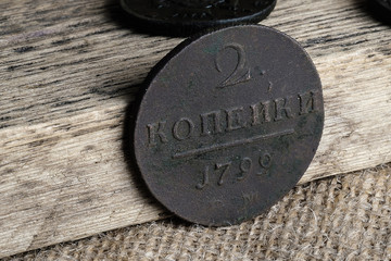 2 kopecks 1799 Russia on a wooden background and canvas cloth