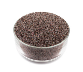Brown Mustard Seeds in Glass Bowl Also Know as Rai Spice isolated on White Background