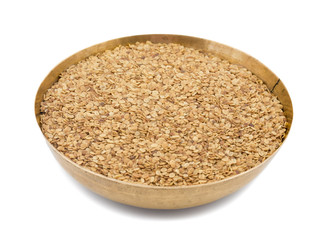 Split Roasted Coriander Seeds also know as Dhana Dal or Sukh Mukh isolated on White Background