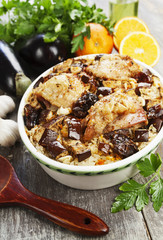Chicken thigh baked with rice, eggplant and figs