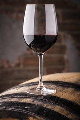 Red wine on a barrel