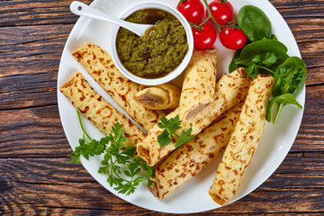 thin pancakes or crepes with meat