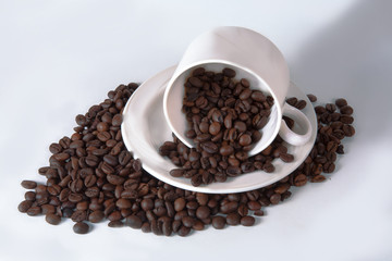 Coffee cup and beans on old kitchen table. Top view with copyspa