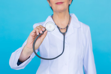 Female doctor with stethoscope, close up