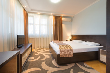 Fototapeta premium Interior of a modern luxury hotel bedroom