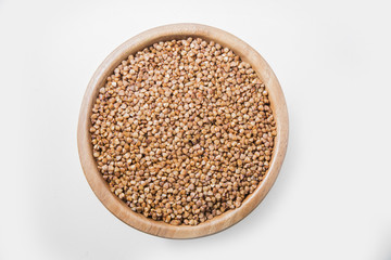 buckwheat in a plate on white background