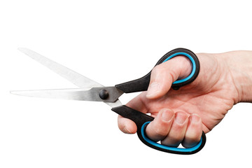 Closeup humans hand holds a scissors isolated on white