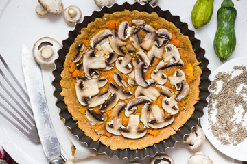 Tasty tart stuffed with vegetables, greens and herbs, Vegan food. Lunch time. 