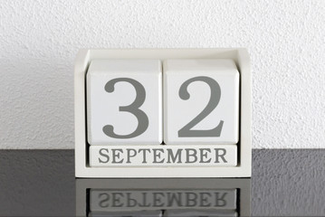 White block calendar present date 32 and month September - Extra day