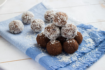 Sweet raw vegan balls. Chocolate, coconut, dates and banana. Moroccan food.