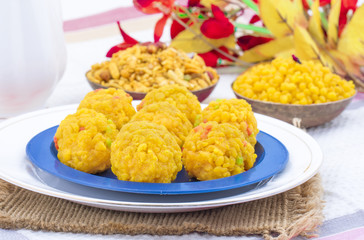 Laddu also know as laddoo, ladoo, laddo are ball-shaped sweets popular in the Indian festivals. Laddu are made of flour, minced dough and sugar with other ingredients