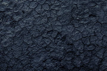 Fototapeta premium Black metal background. The surface of the pan to the oven. Fantasy art processing of photos for a collage. Toned