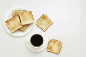 Toast and coffee on a white background.