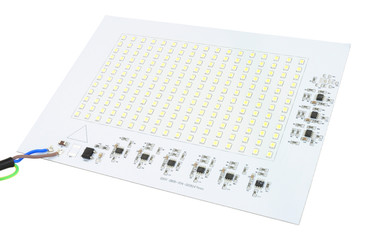 Mains voltage high intensity LED flood lighting circuit board isolated on a white background