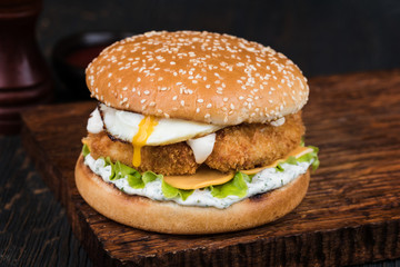 Burger on a wooden board