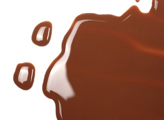Spilled chocolate milk puddle isolated on white background, top view