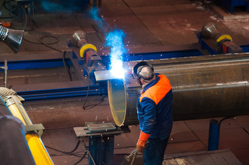 Fototapeta na wymiar Manufacture of steel pipes