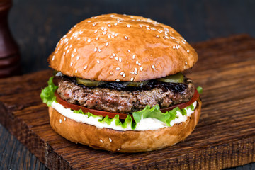 Burger on a wooden board