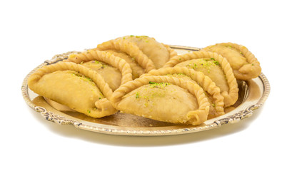 Gujiya or Gujia is a indian sweet dumpling made with suji, Maida or wheat flour and stuffed with khoya. It is common in North India, particularly in Bihar, Uttar Pradesh, Madhya Pradesh or Rajasthan