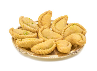 Gujiya or Gujia is a indian sweet dumpling made with suji, Maida or wheat flour and stuffed with khoya. It is common in North India, particularly in Bihar, Uttar Pradesh, Madhya Pradesh or Rajasthan