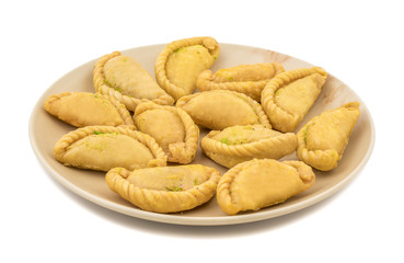 Gujiya or Gujia is a indian sweet dumpling made with suji, Maida or wheat flour and stuffed with khoya. It is common in North India, particularly in Bihar, Uttar Pradesh, Madhya Pradesh or Rajasthan
