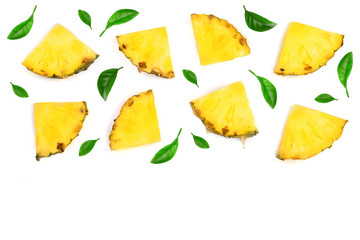 Naklejka premium Sliced pineapple decorated with green leaves isolated on white background with copy space for your text. Top view
