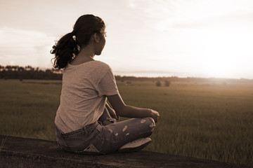 Fototapeta na wymiar Meditation At Sunset