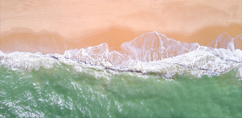 Aerial view of tropical sandy beach and ocean. Copy space