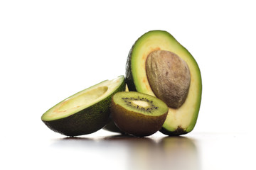 Fruit avocado and kiwi. White background, copy space.