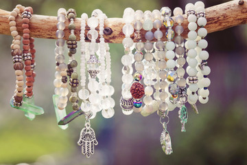 Natural bead bracelets hanging on natural branch