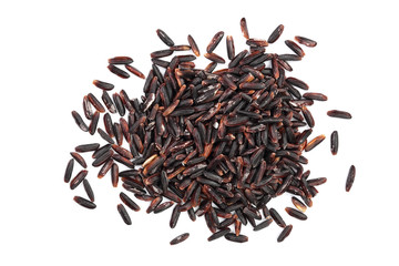 Black wild rice isolated on white background close up. Top view. Flat lay