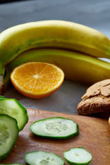Ingredients for school lunch and plastic container on the table, close-up, selective focus