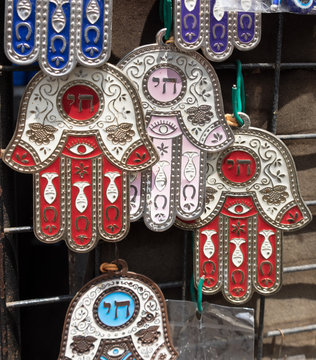 Hamsa with "Chai" symbol - "Living" sale at Carmel Market, popular marketplace in Tel-Aviv. Israel