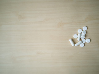 Fototapeta na wymiar medicine close up image on wood table.