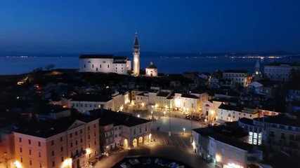 Night flight around old town Piran, Slovenia