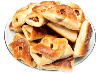 Buns with raisins and jam on a white background