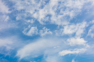 Clouds on a blue sky as a background