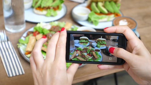 Woman Hands Photographing Healthy Vegan Food At Lunch