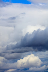 Clouds on a blue sky as a background