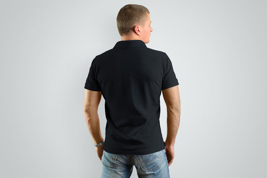 Back Mockup  black polo  shirt on a male model for an example design.