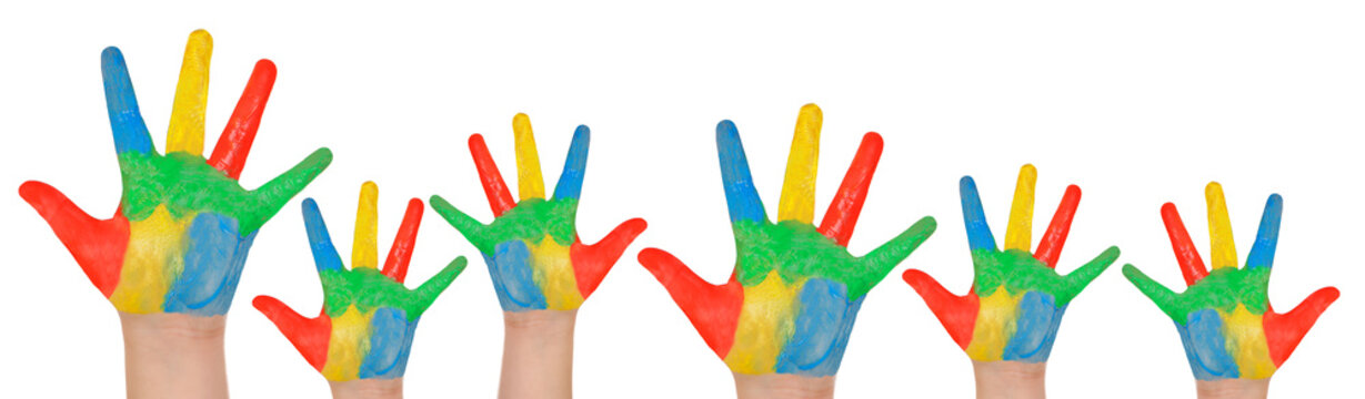 Children's hands full of paint