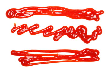 Naklejka premium Red ketchup spreading, splashes isolated on white background, tomato pure texture, top view