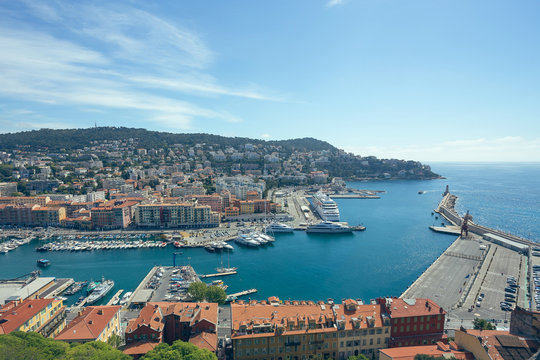 Panoramic view of Nice harbour with blue sky and Luxury Yachts, French Riviera, France